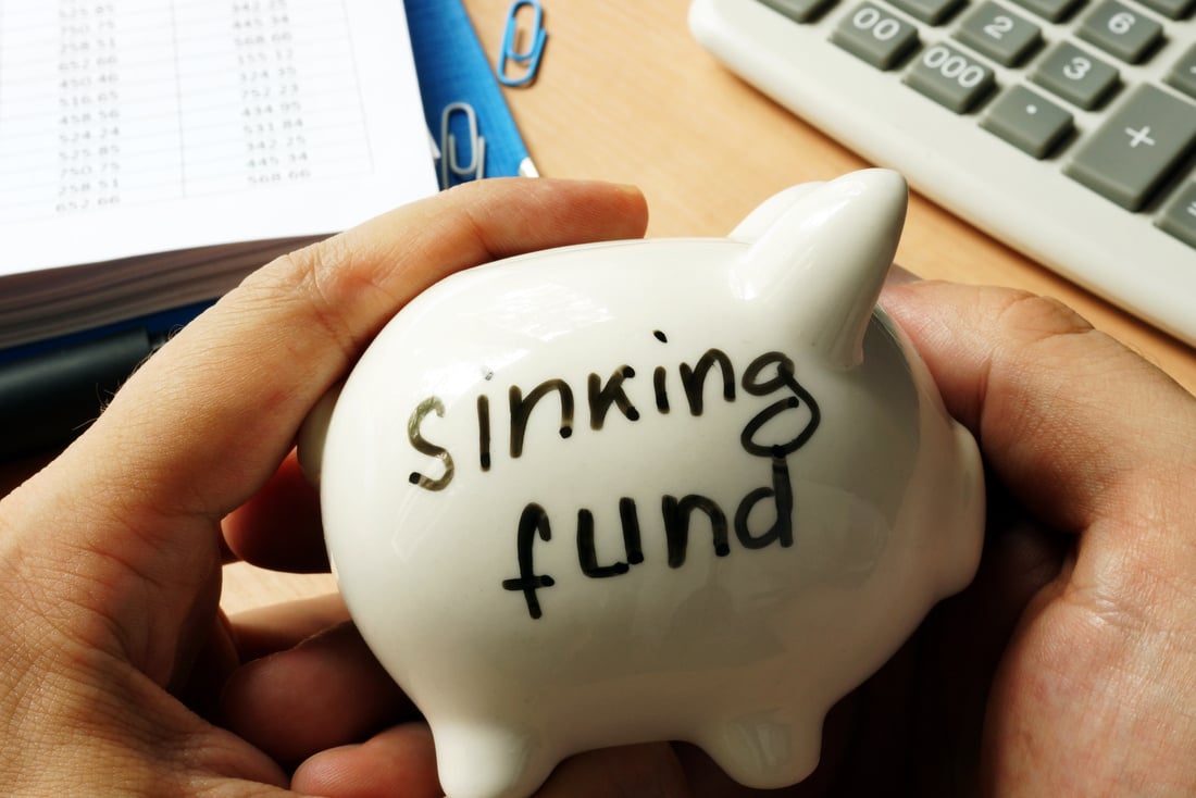 Piggy bank with sign sinking fund.